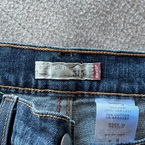 Levi's Dark Blue Bootcut Jeans with Gold Stitching